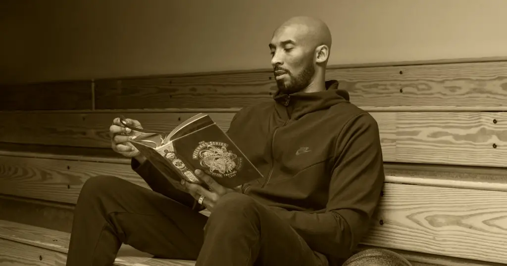 athlete reading a book